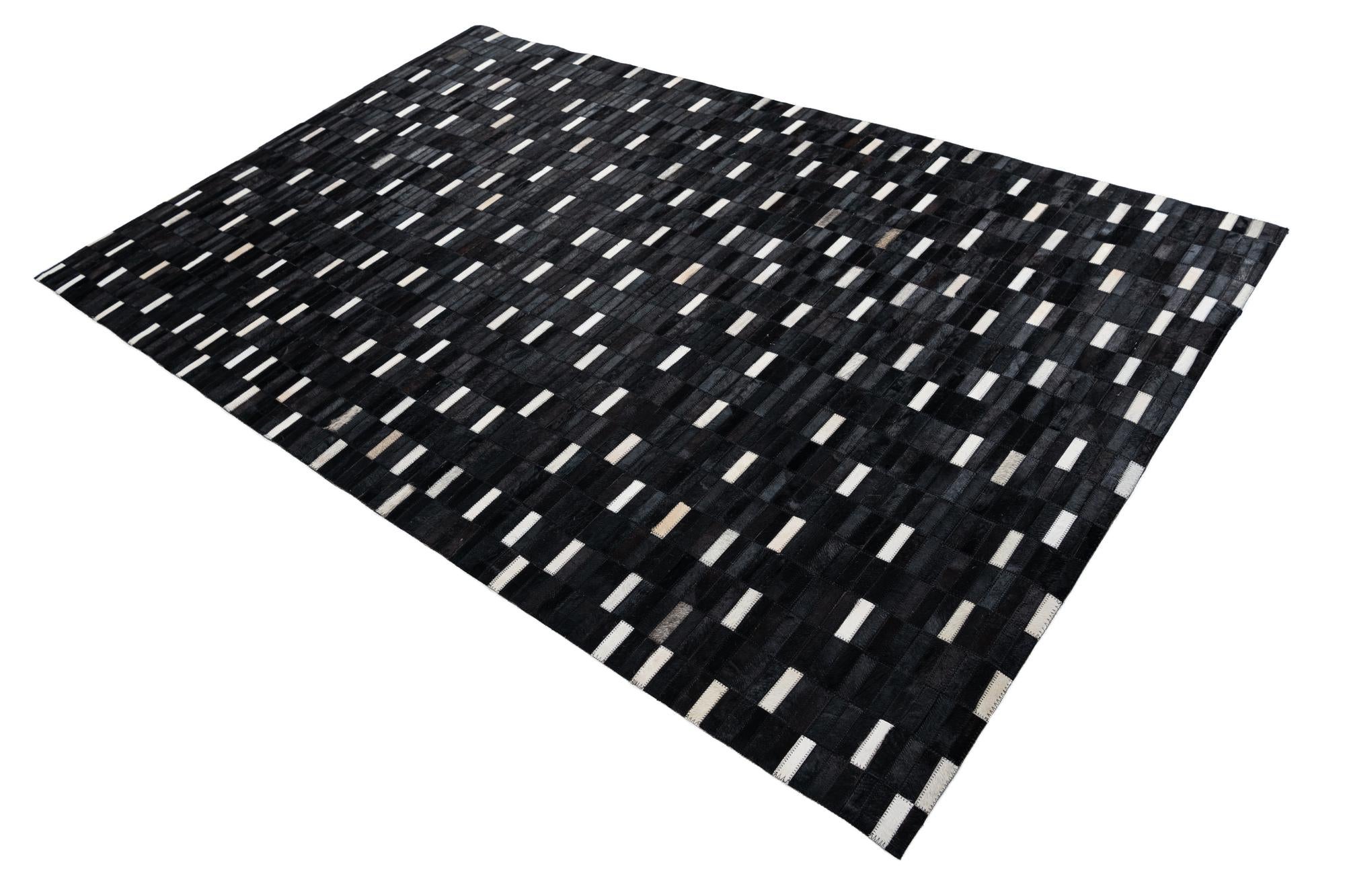 5' 1 x 8' 1 Cowhide Leather Rug