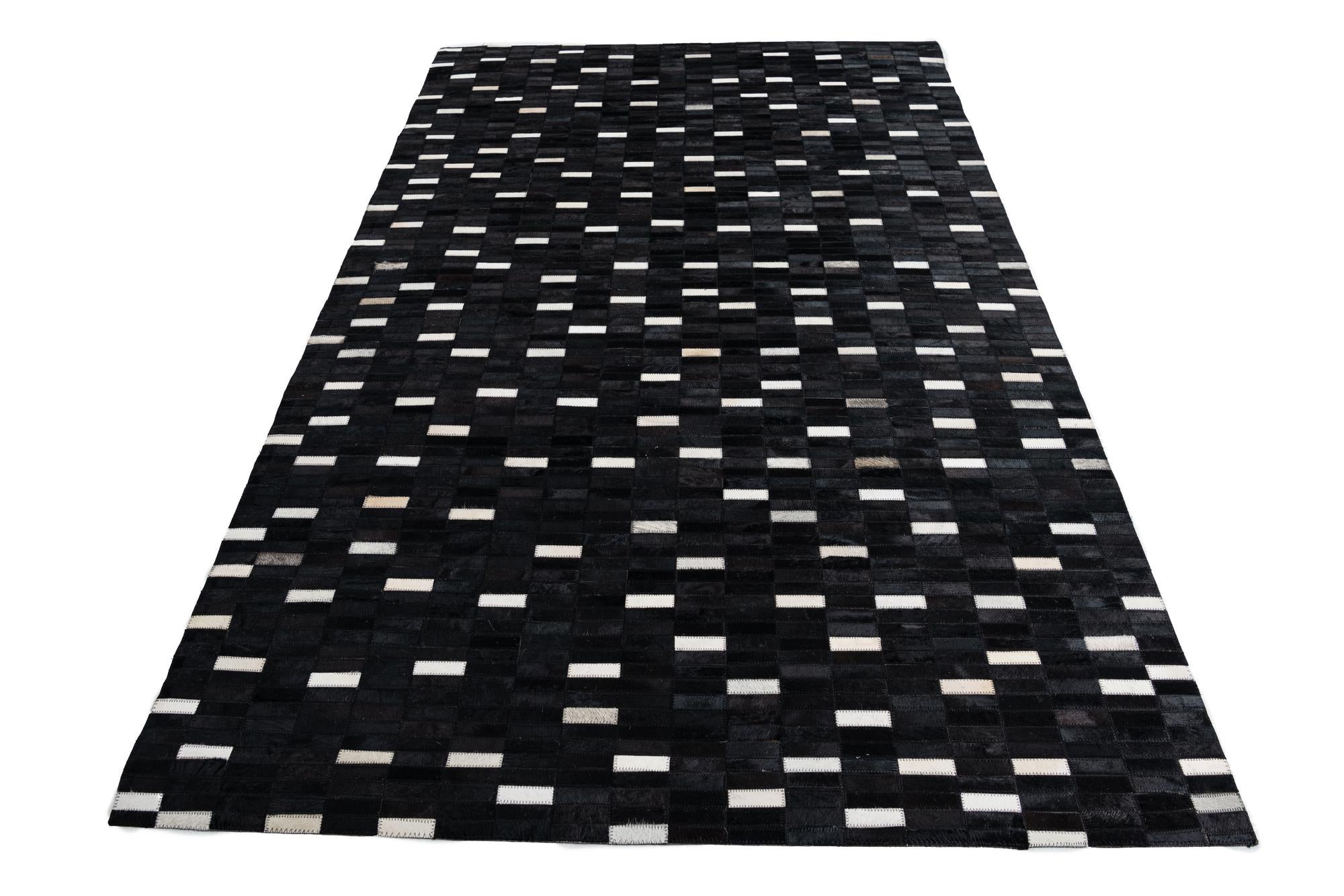 5' 1 x 8' 1 Cowhide Leather Rug