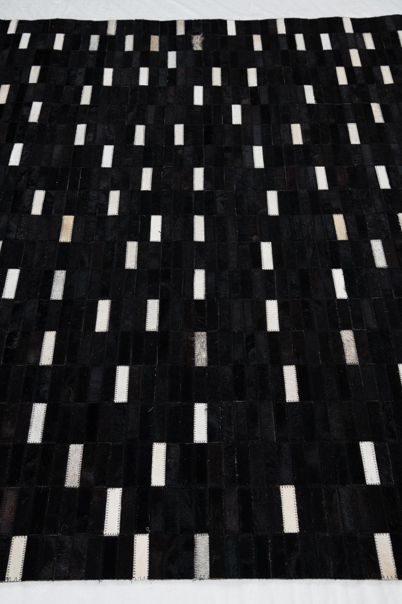 5' 1 x 8' 1 Cowhide Leather Rug