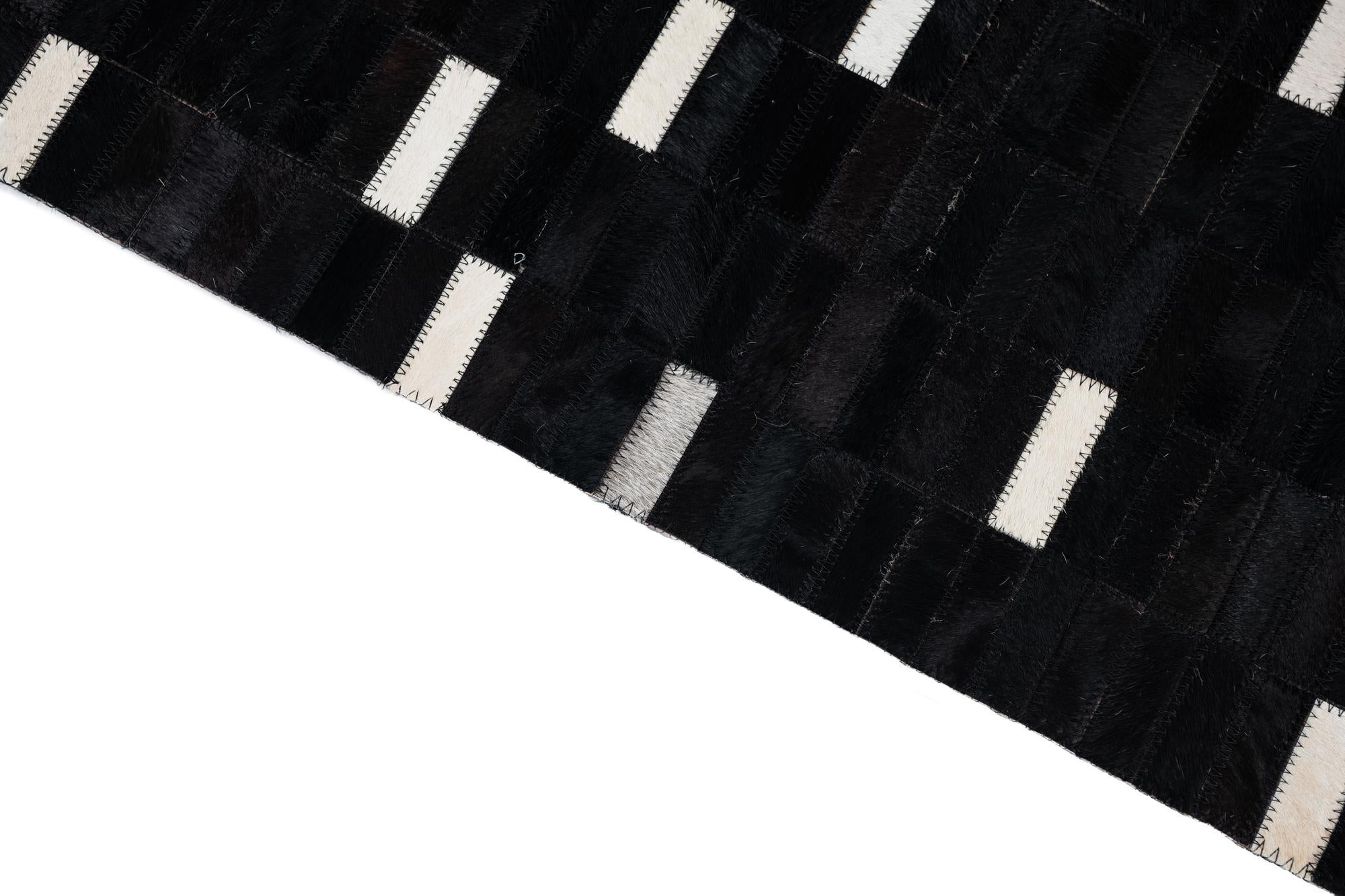 5' 1 x 8' 1 Cowhide Leather Rug