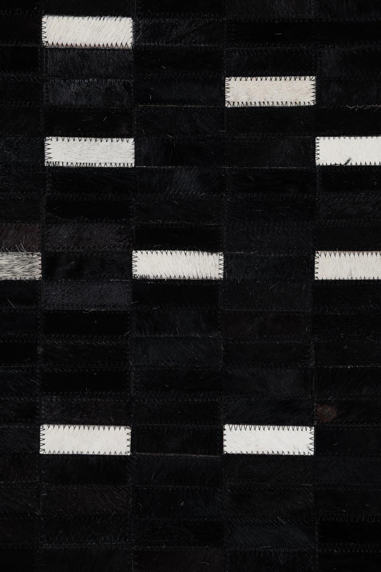 5' 1 x 8' 1 Cowhide Leather Rug