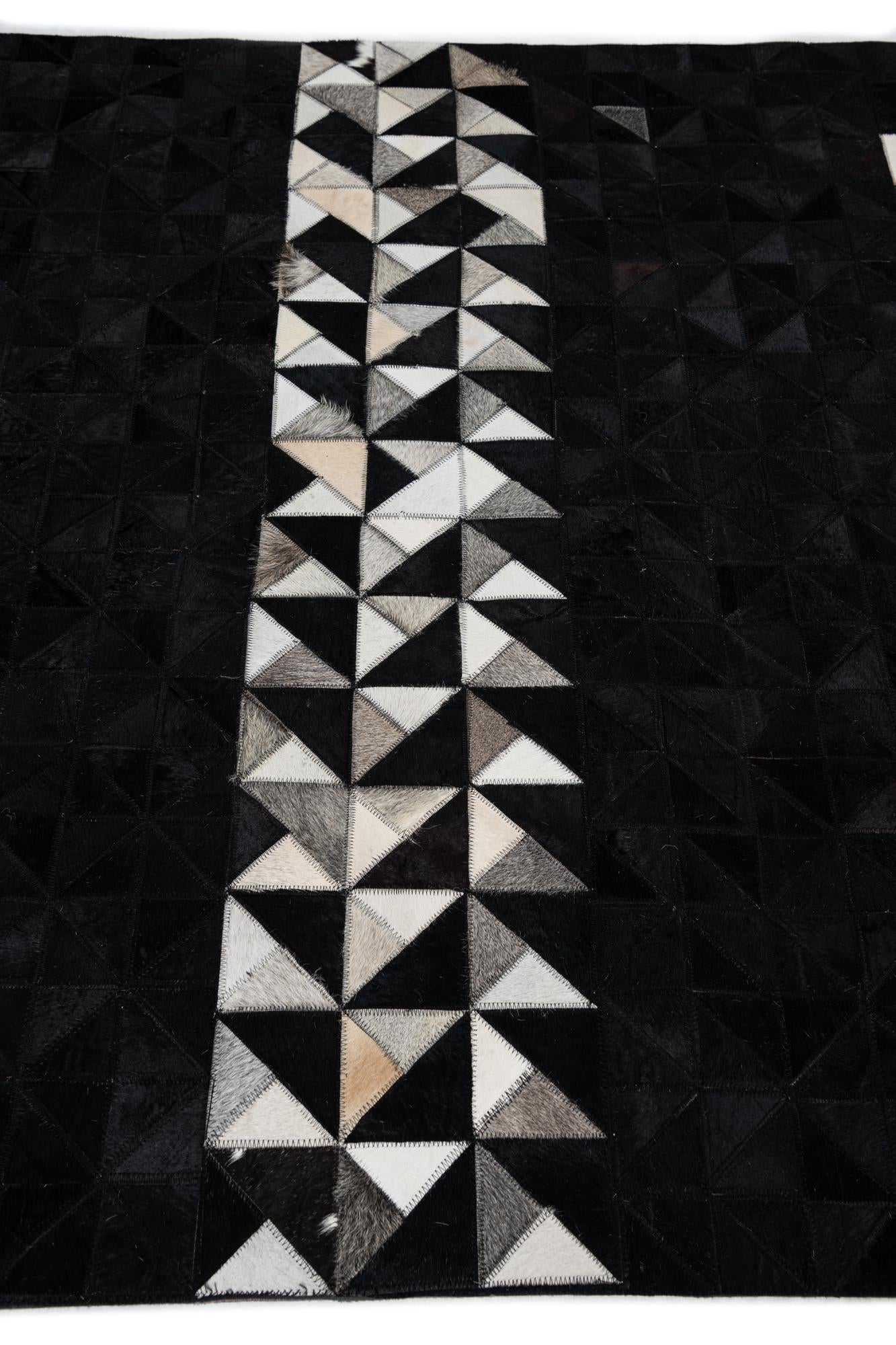5' 1 x 7' 10 Cowhide Leather Rug