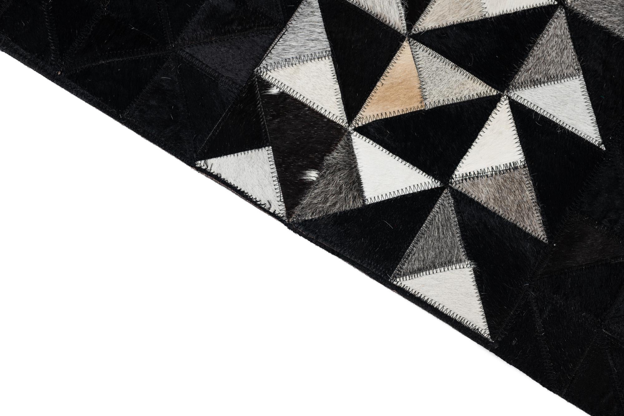 5' 1 x 7' 10 Cowhide Leather Rug