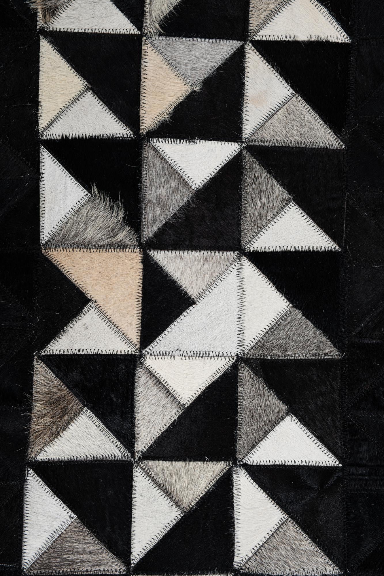 5' 1 x 7' 10 Cowhide Leather Rug