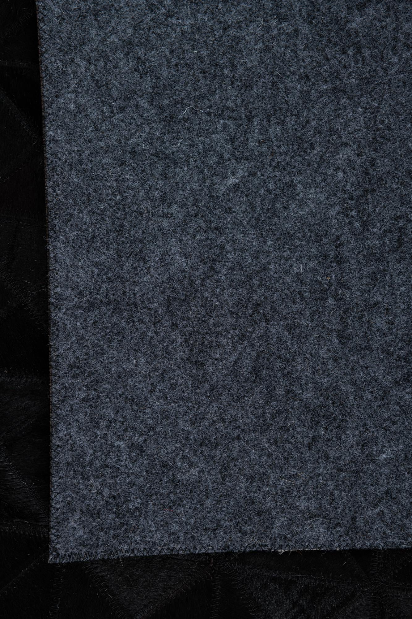 5' 1 x 7' 10 Cowhide Leather Rug