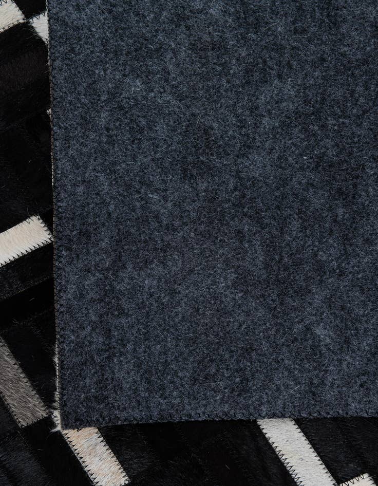 Detail image of 4' 9 x 8' 1 Cowhide Leather Rug