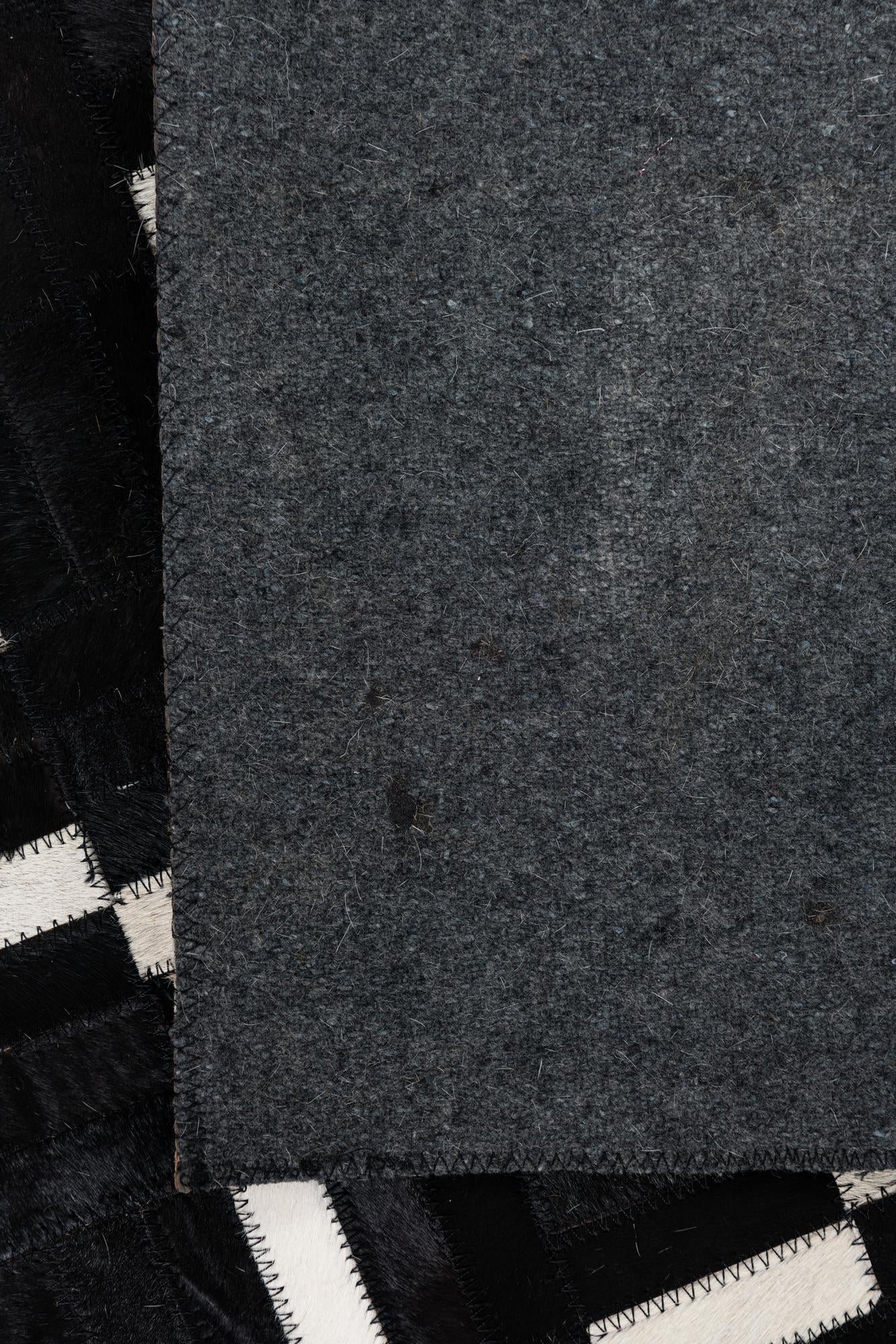 7' 10 x 10' 2 Cowhide Leather Rug