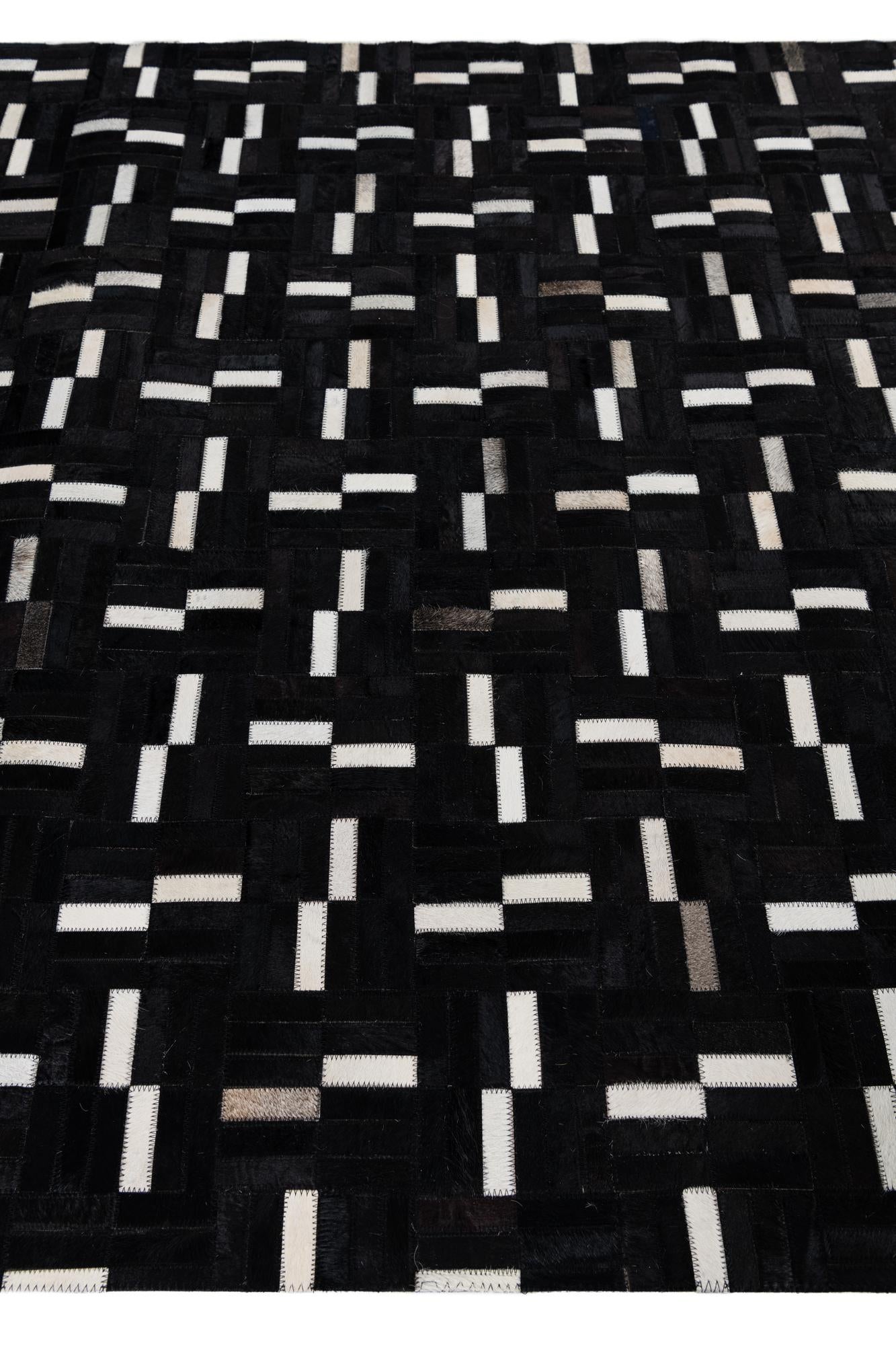 5' 3 x 8' 1 Cowhide Leather Rug