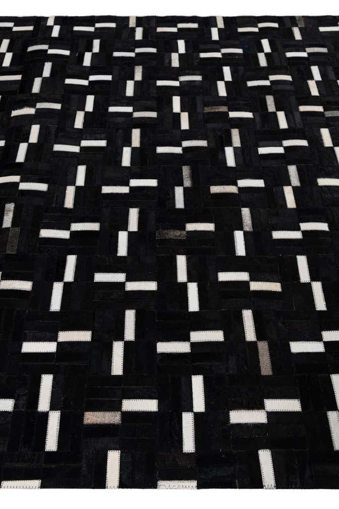 5' 3 x 8' 1 Cowhide Leather Rug