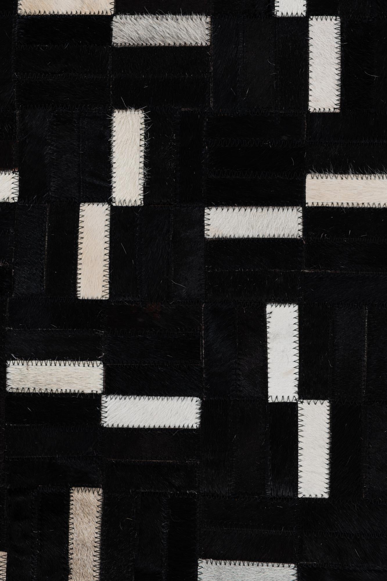 5' 3 x 8' 1 Cowhide Leather Rug