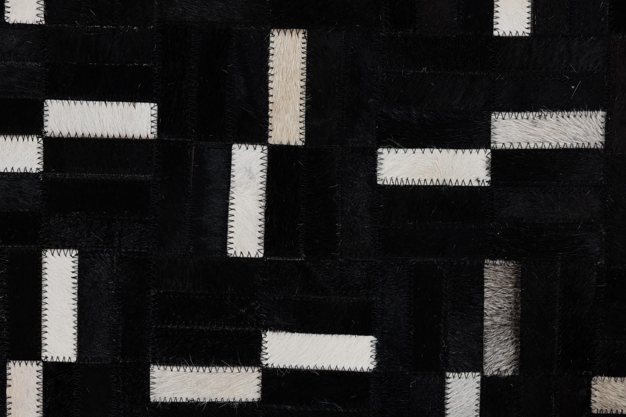 5' 3 x 8' 1 Cowhide Leather Rug