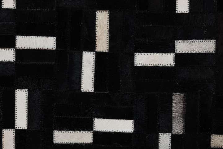 5' 3 x 8' 1 Cowhide Leather Rug
