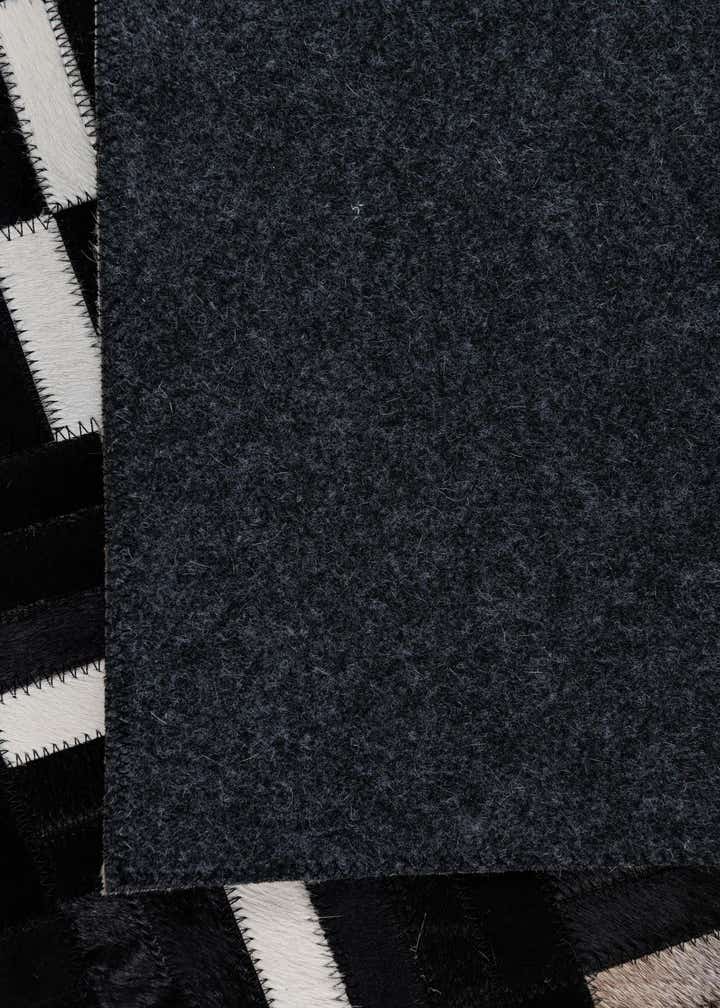 5' 3 x 8' 1 Cowhide Leather Rug