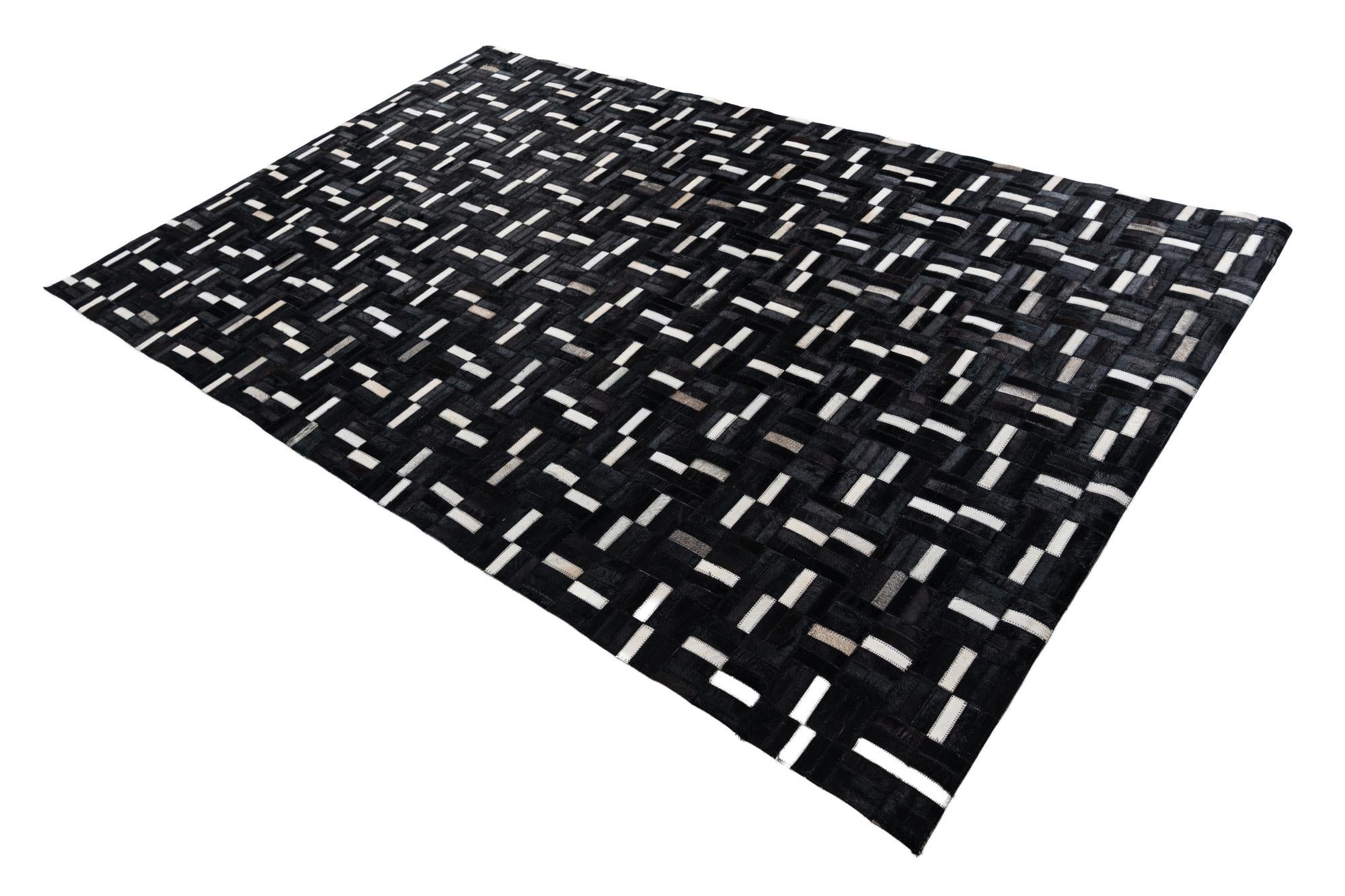 5' 2 x 8' 2 Cowhide Leather Rug