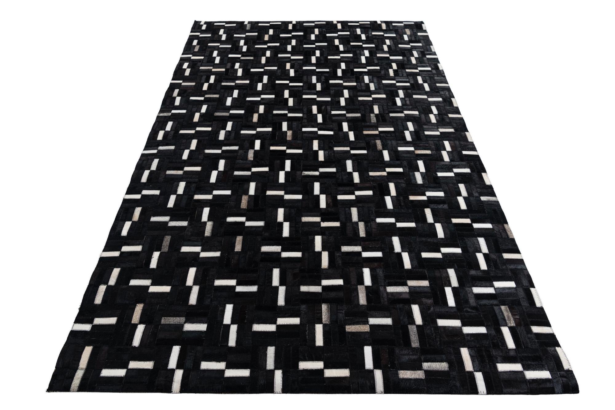 5' 2 x 8' 2 Cowhide Leather Rug