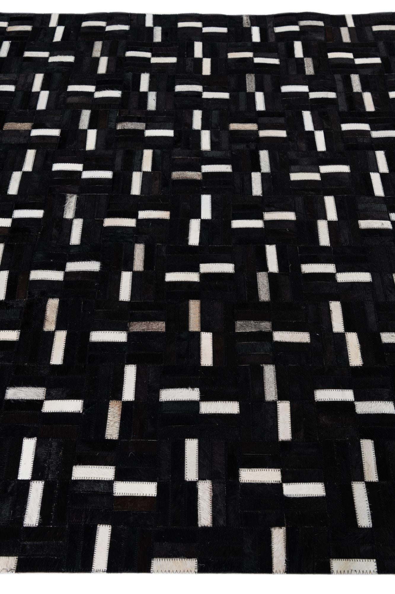 5' 2 x 8' 2 Cowhide Leather Rug