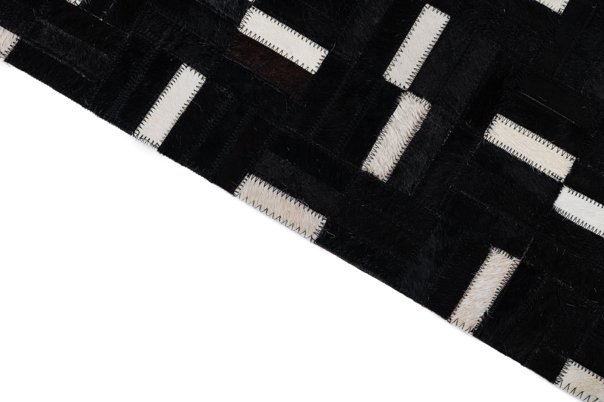5' 2 x 8' 2 Cowhide Leather Rug