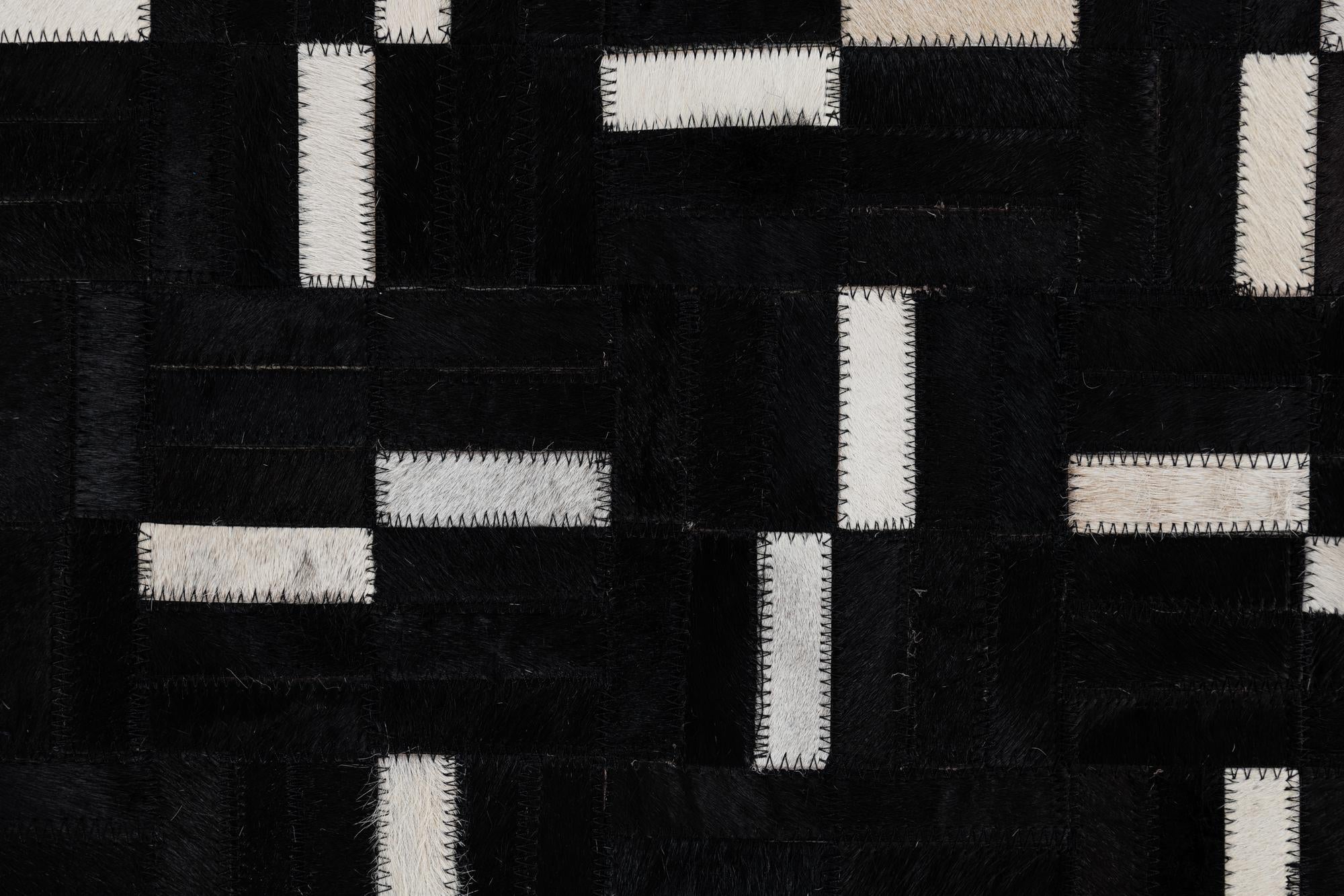 5' 2 x 8' 2 Cowhide Leather Rug