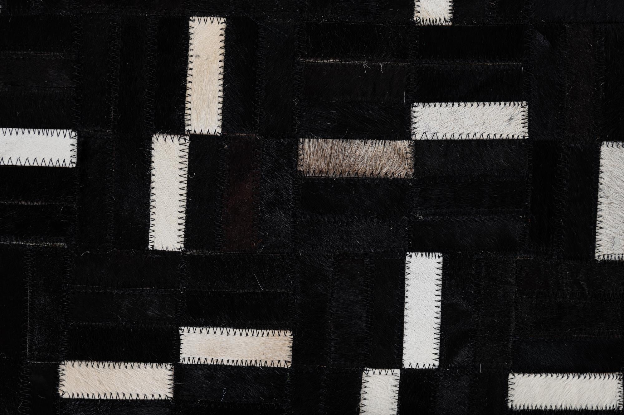 5' 2 x 8' 2 Cowhide Leather Rug