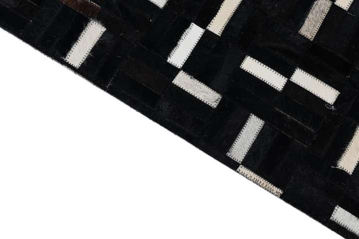 5' 1 x 8' 1 Cowhide Leather Rug