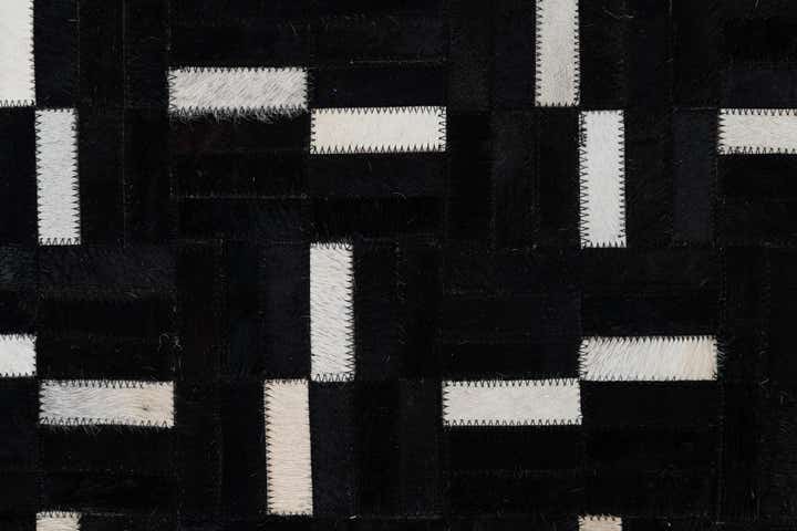 5' 1 x 8' 1 Cowhide Leather Rug