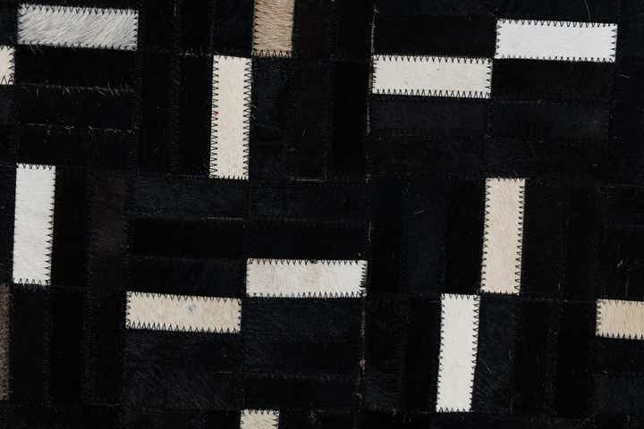 5' 1 x 8' 1 Cowhide Leather Rug