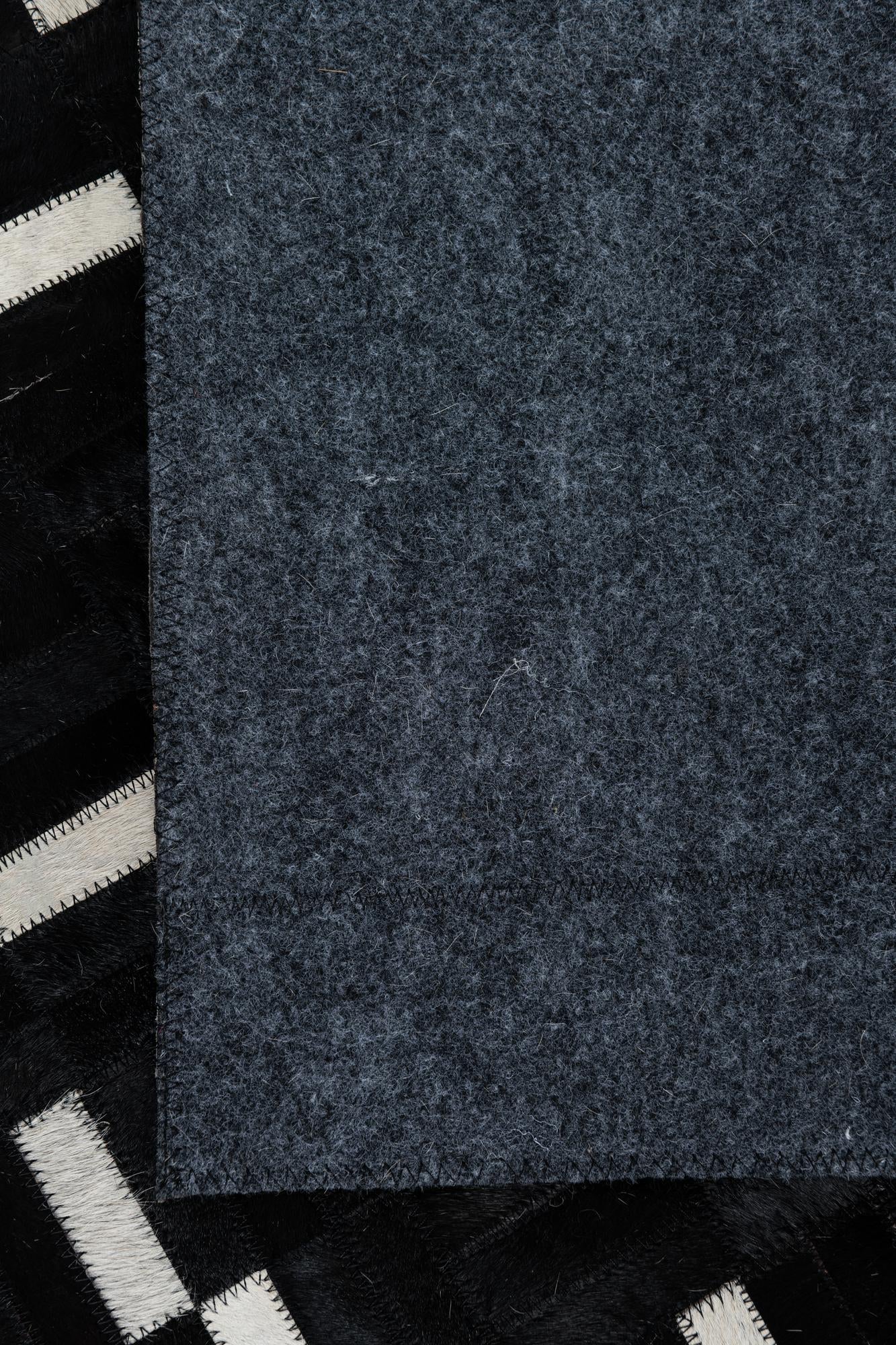 7' 9 x 9' 7 Cowhide Leather Rug