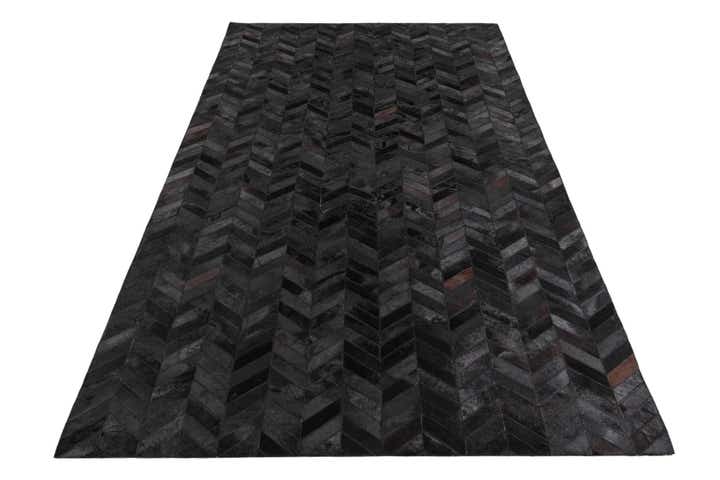 5' 2 x 8' 1 Cowhide Leather Rug