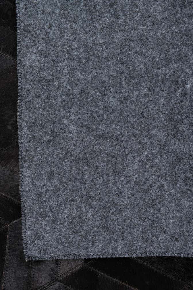 5' 2 x 8' 1 Cowhide Leather Rug