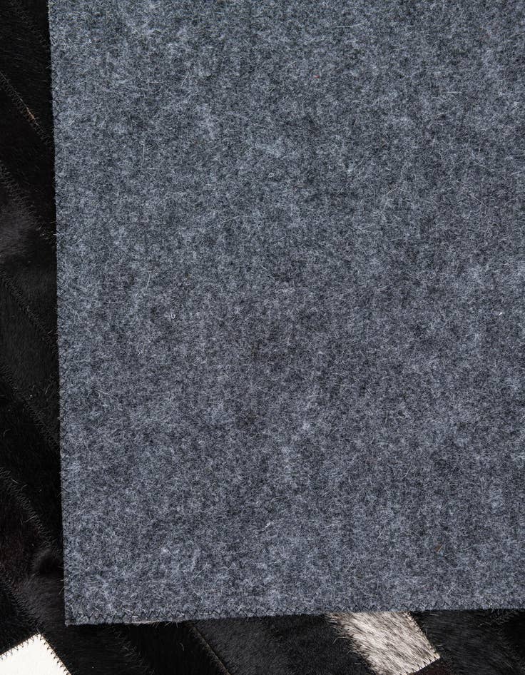 Detail image of 5' 1 x 8' Cowhide Leather Rug