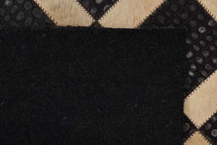 2' 1 x 3' 1 Cowhide Rug