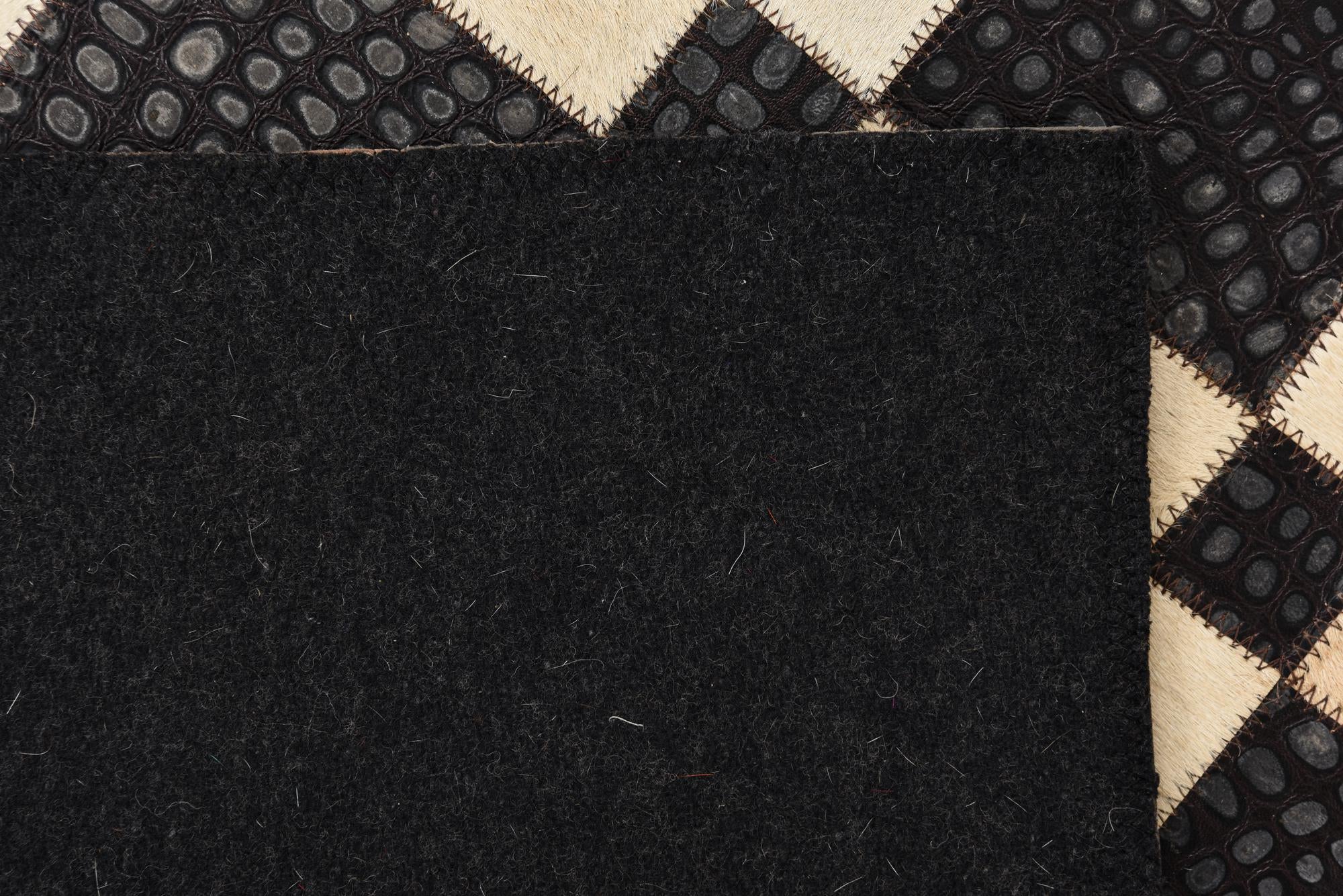 2' 1 x 3' Cowhide Rug