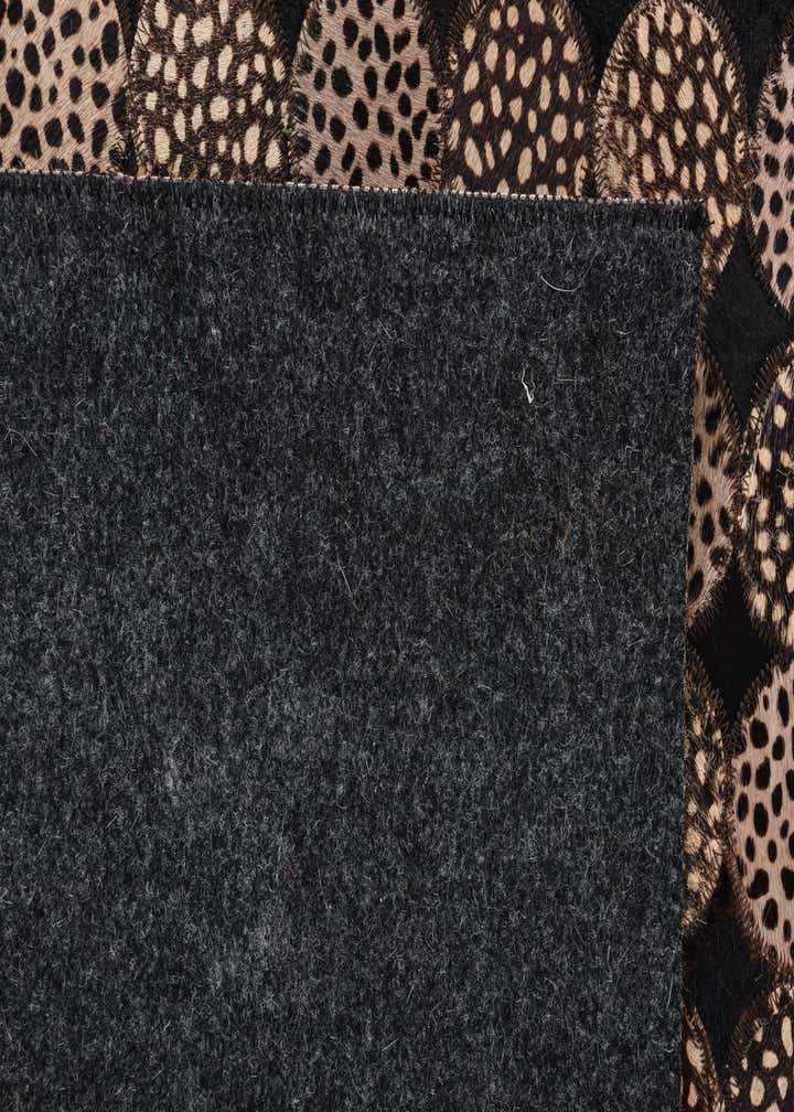 5' 2 x 7' 6 Cowhide Rug