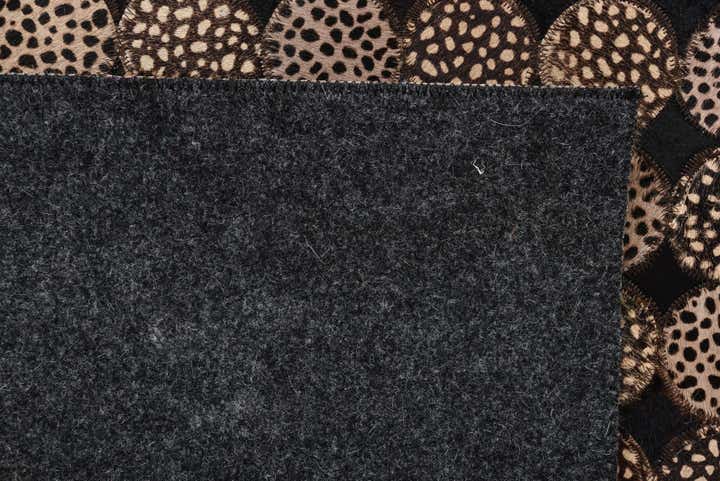 5' 2 x 7' 6 Cowhide Rug