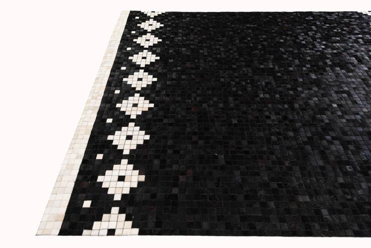 Detail image of 8' 2 x 10' Cowhide Stocks Rug