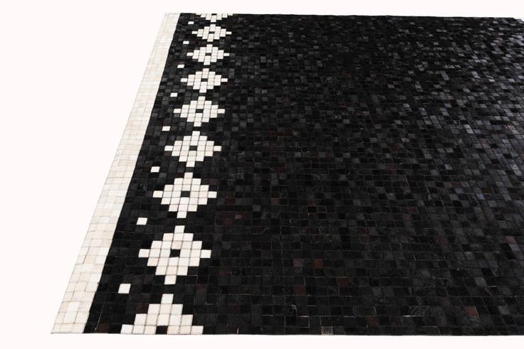 Detail image of 8' 2 x 10' Cowhide Stocks Rug