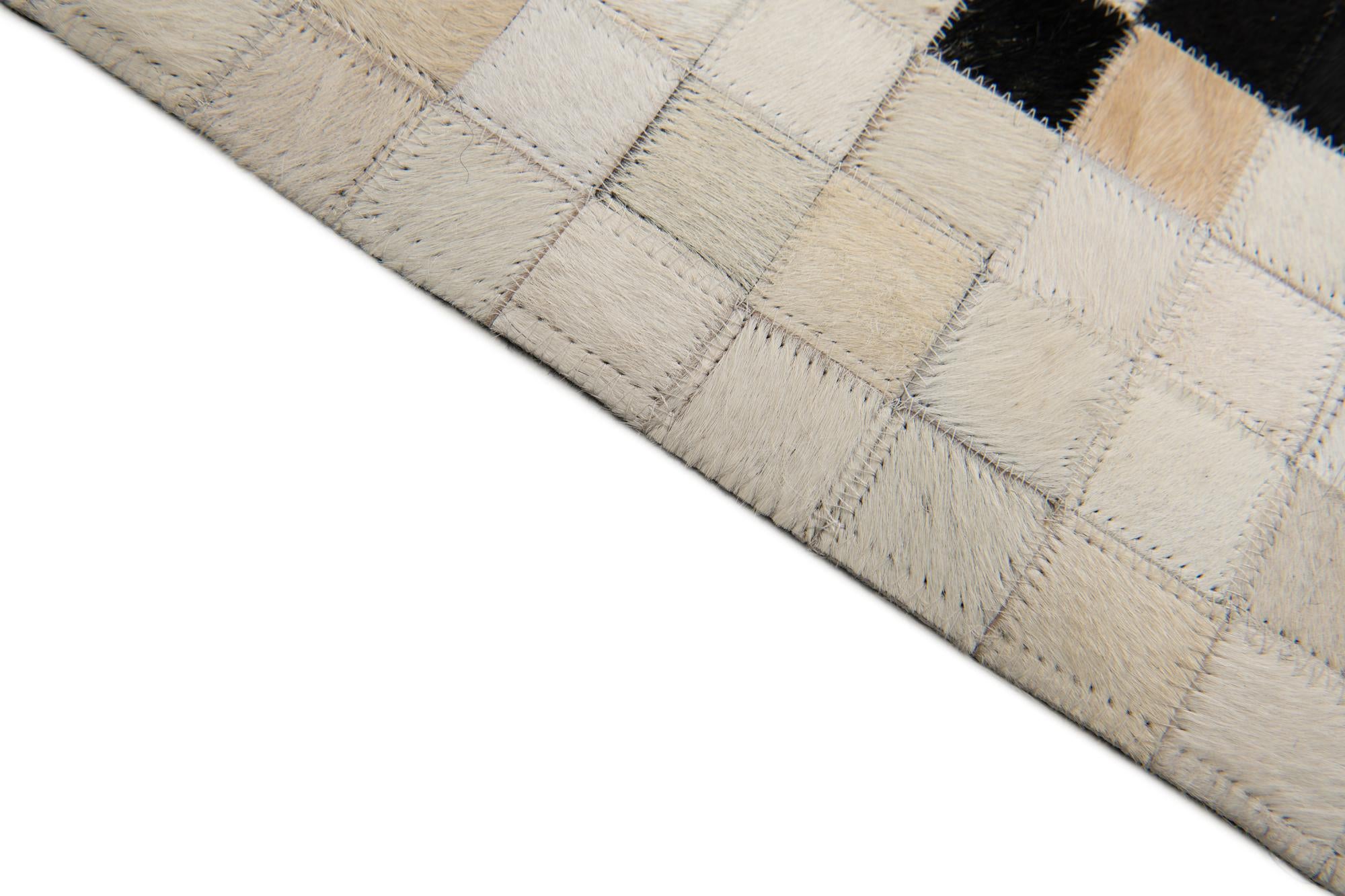 8' 1 x 9' 11 Cowhide Stocks Rug