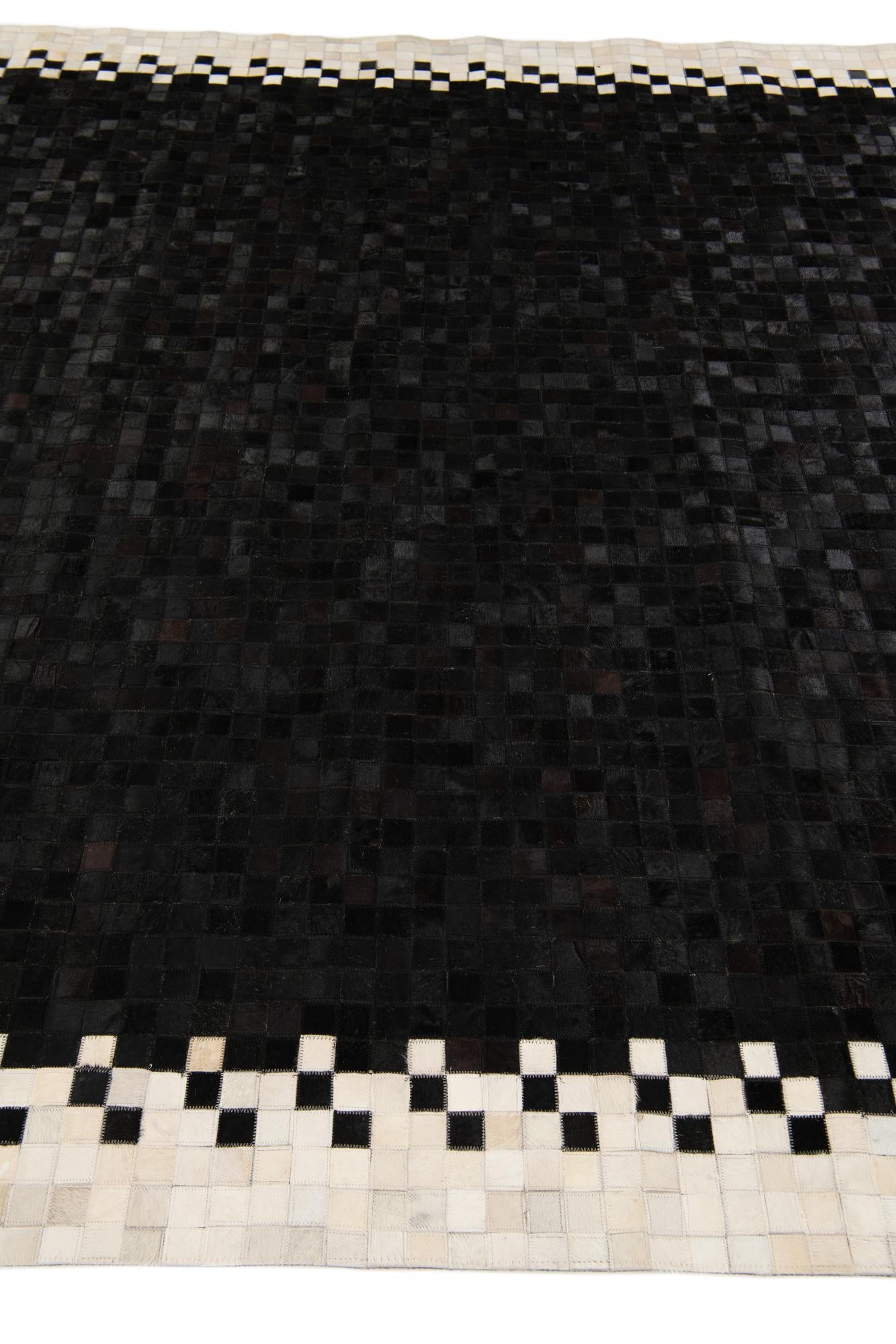 8' 1 x 9' 11 Cowhide Stocks Rug