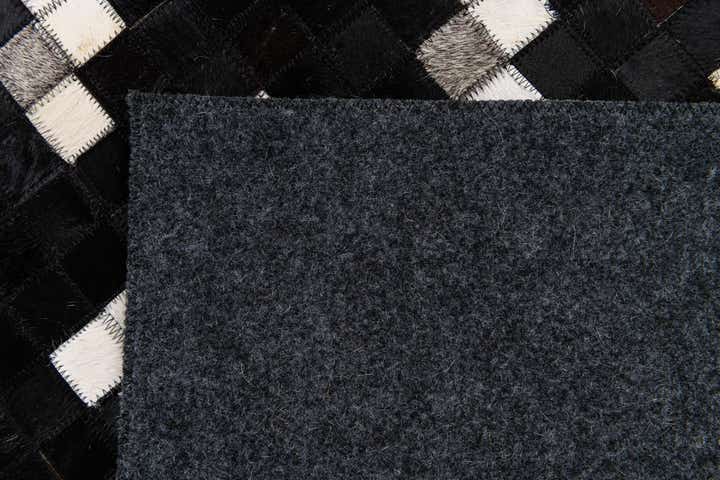 7' 11 x 9' 10 Cowhide Stocks Rug