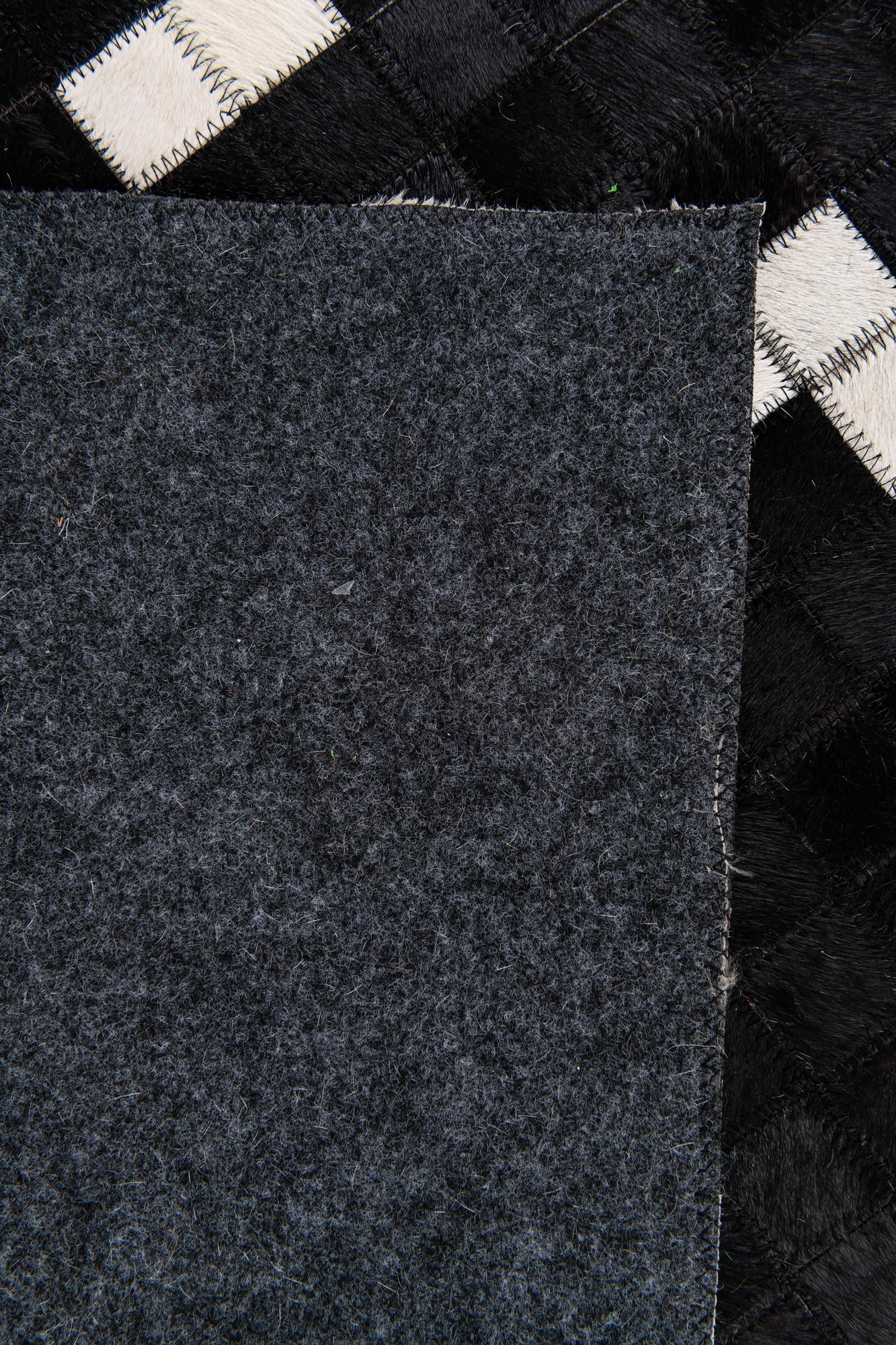 7' 11 x 9' 10 Cowhide Stocks Rug