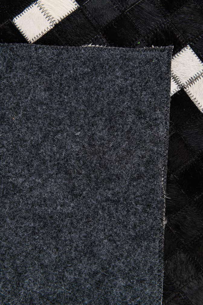 7' 11 x 9' 10 Cowhide Stocks Rug