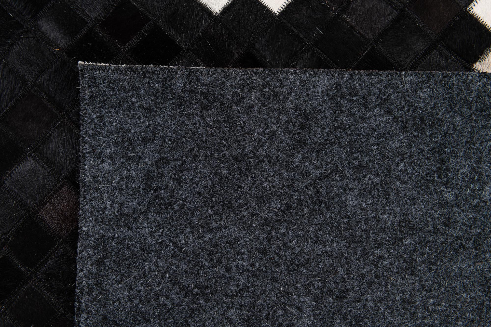 7' 11 x 9' 8 Cowhide Stocks Rug