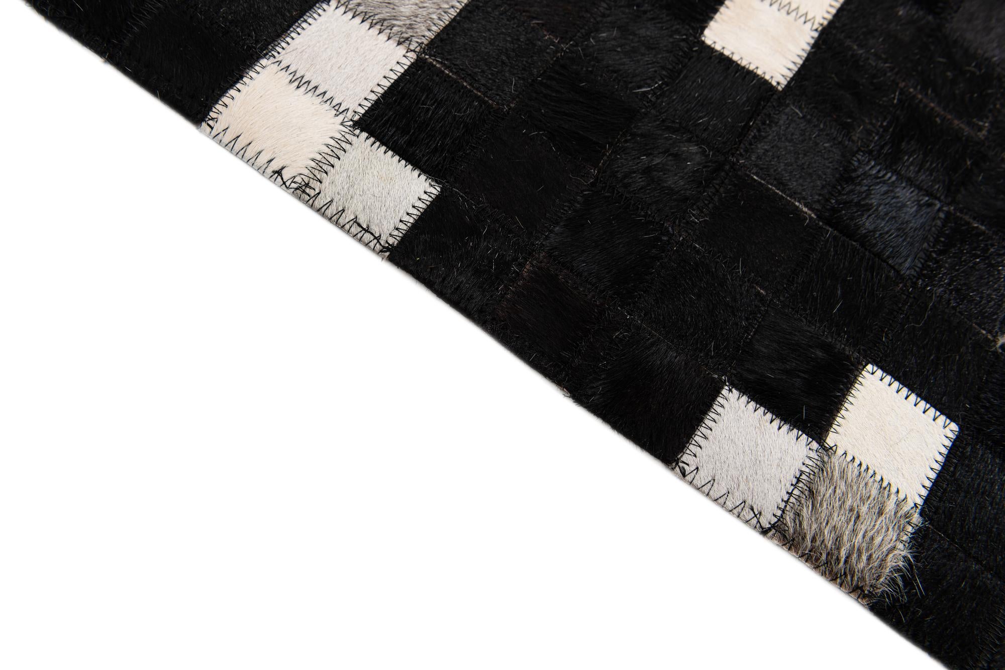 7' 11 x 9' 10 Cowhide Stocks Rug