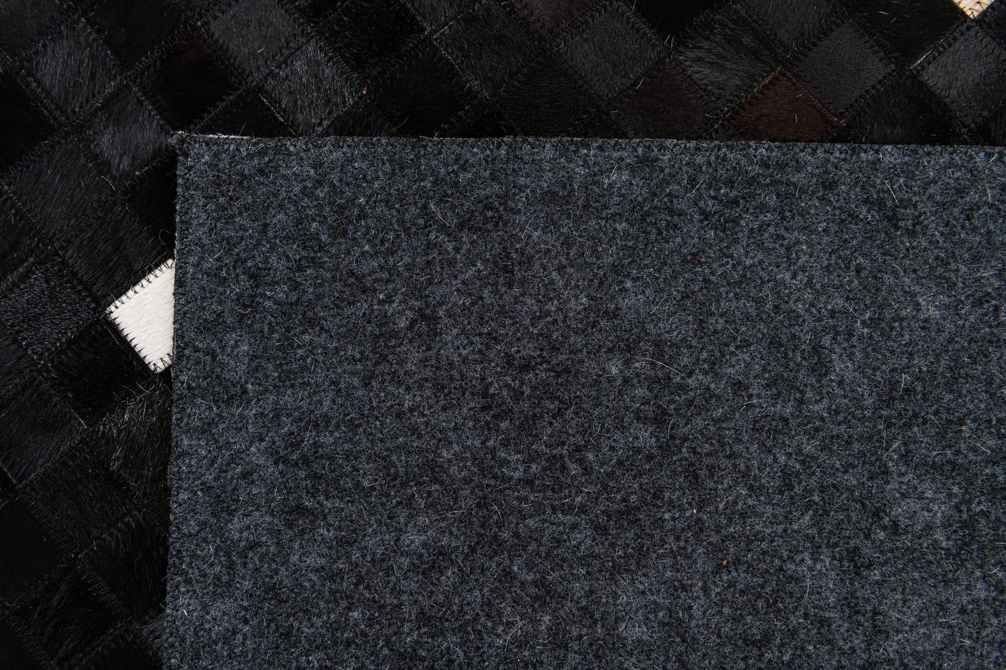 7' 11 x 9' 10 Cowhide Stocks Rug