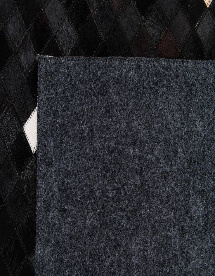 Detail image of 7' 11 x 9' 10 Cowhide Stocks Rug