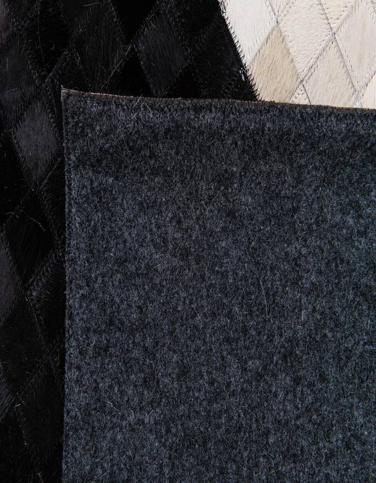 Detail image of 8' 1 x 9' 11 Cowhide Stocks Rug