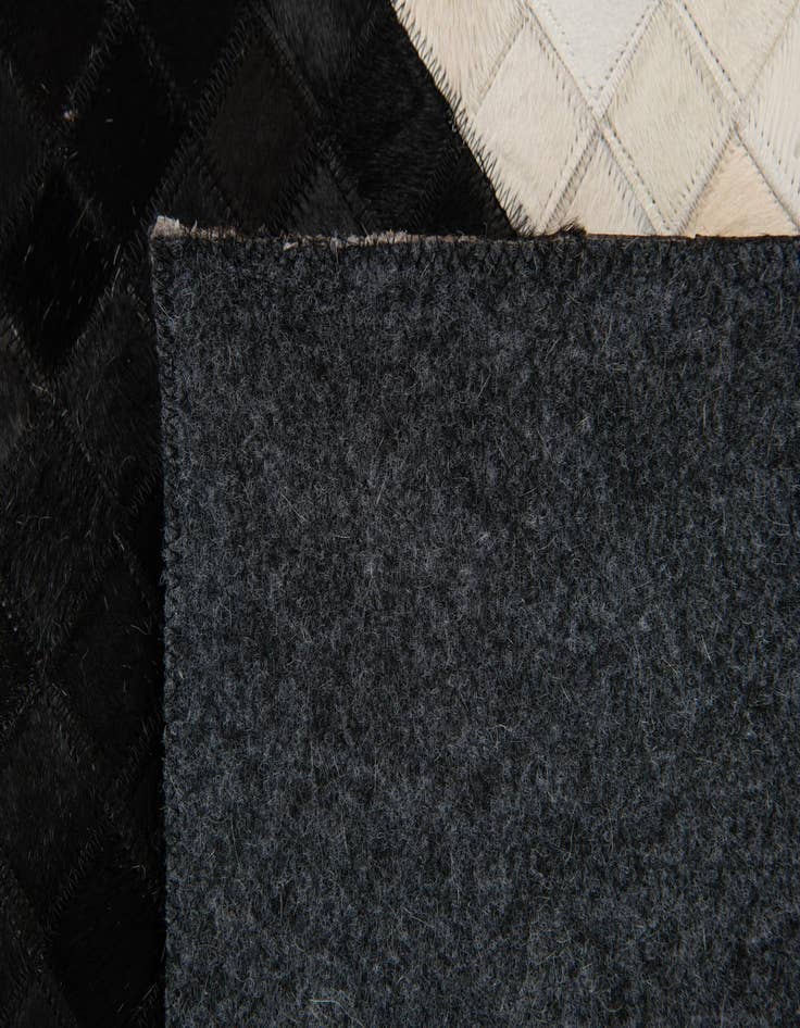 Detail image of 7' 11 x 9' 10 Cowhide Stocks Rug