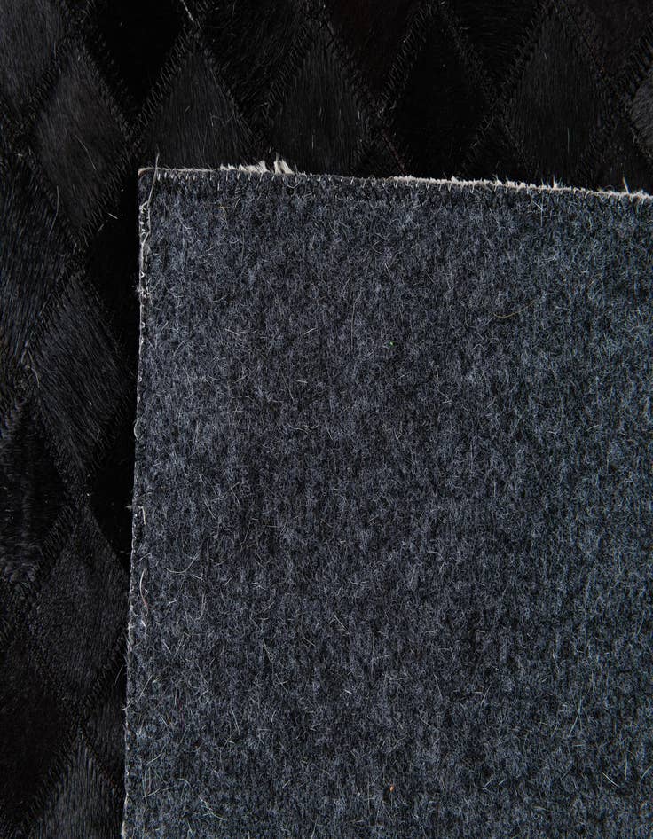 Detail image of 8' x 10' 3 Cowhide Stocks Rug