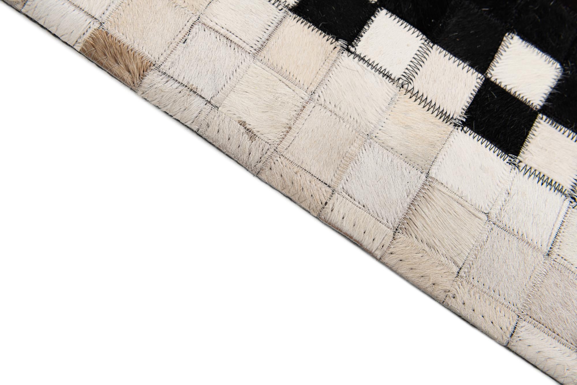8' 2 x 9' 11 Cowhide Stocks Rug