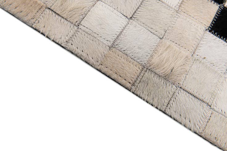 Detail image of 8' 1 x 9' 11 Cowhide Stocks Rug
